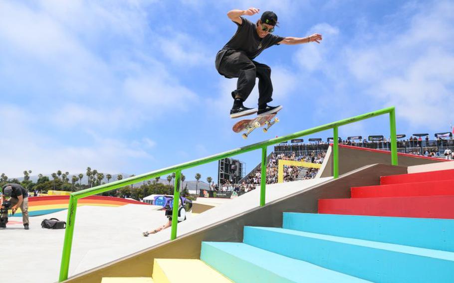 a participant is jumping with a skateboard.