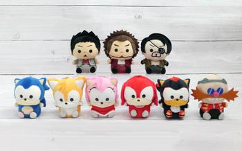 9 stuffed toys are on the table.