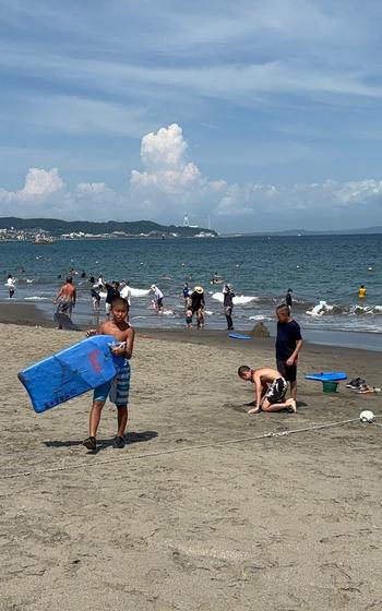 People enjoy themselves on Miura Beach.