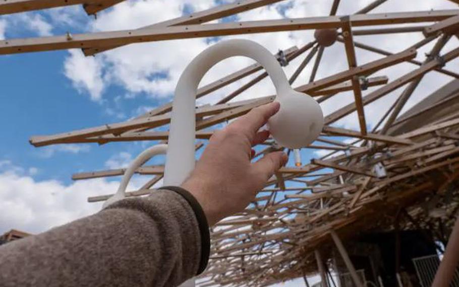 “FULUto,” a wriggling cluster of playful objects that seemed to sprout from the ground like asparagus