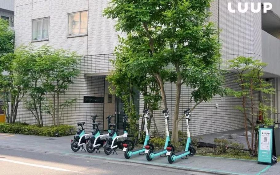 LUUP’s e-bikes and e-scooters lined up at a Port station.