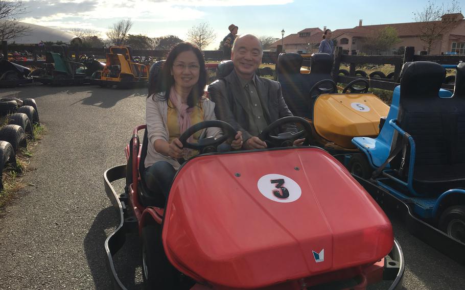 two people are enjoying a car.