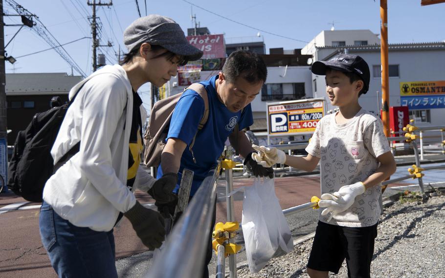 More than 36 bags of trash, equaling 180 gallons of debris, were collecting during an annual Fussa city beautification project sponsored by enlisted airmen at Yokota Air Base, Japan, May 3, 2024.