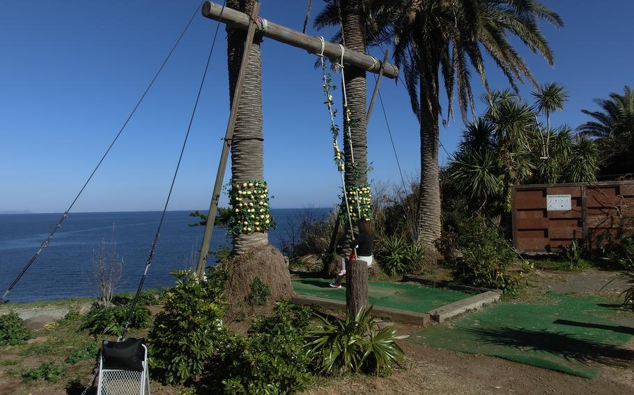 A swing near the sea in Asian Garden R-Asia.
