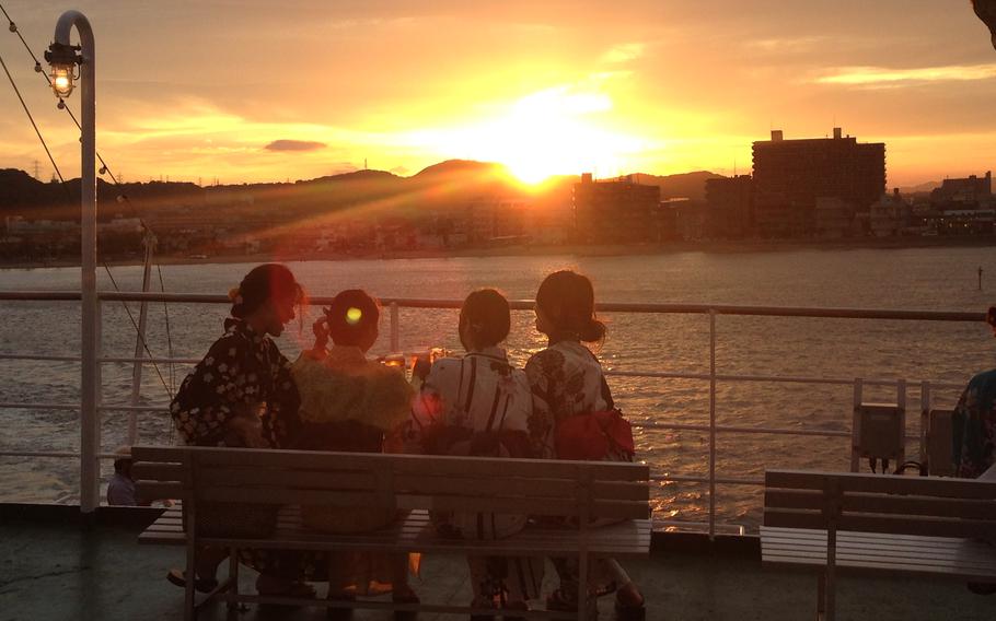 Women looking at the ocean.