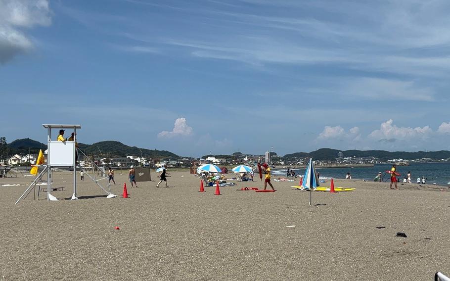 People enjoy themselves on Miura Beach.