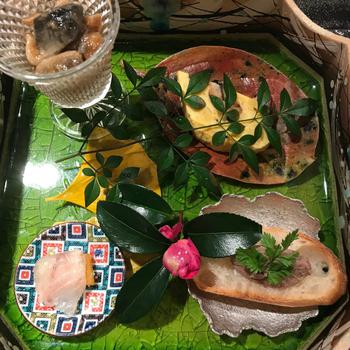 Dishes are beautifully put on a tray.
