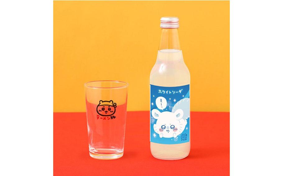 white soda and a glass on the table.