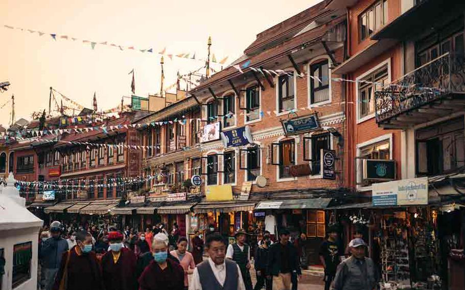 Square around Boudhanath Stupa at sunset