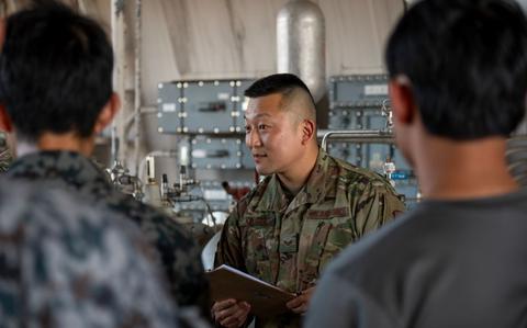 Photo Of U.S. Air Force Senior Airman Tadayoshi Kiriyama translates for Japan Air Self-Defense Force members during training to prepare for exercise Resolute Force Pacific 2025 at Misawa Air Base, Japan.