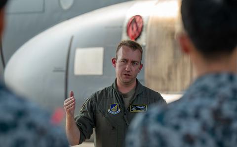 Photo Of U.S. Air Force Capt. William Waller, 36th Airlift Squadron C-130J Super Hercules pilot, speaks to newly assigned members from the Japan Air Self-Defense Force Operations Support Wing and Air Intelligence Wing.