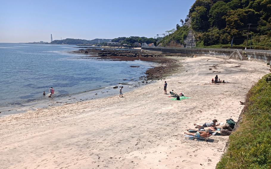 Some people are enjoying the beach.