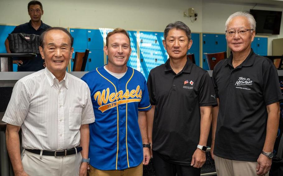 Four of the participants pose for a group photo.