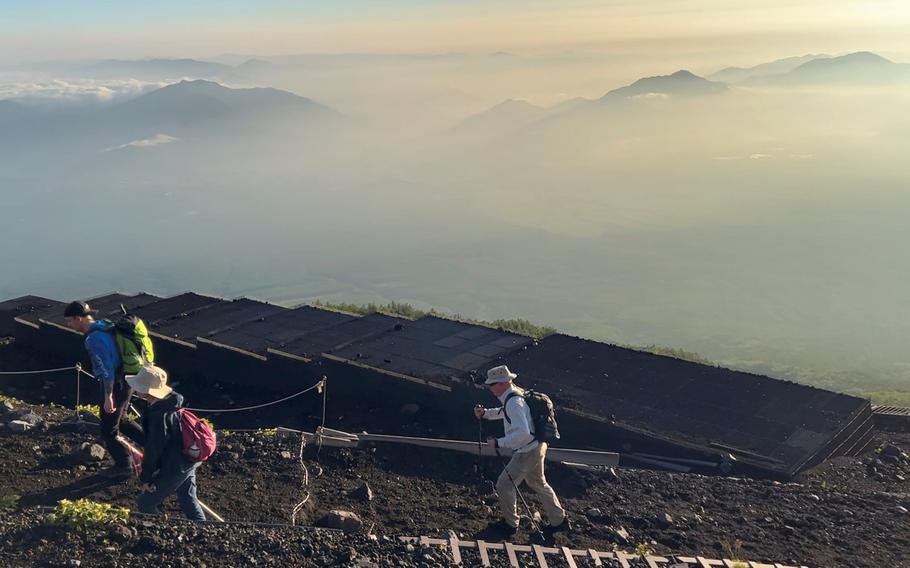people climbing Mt. Fuji.