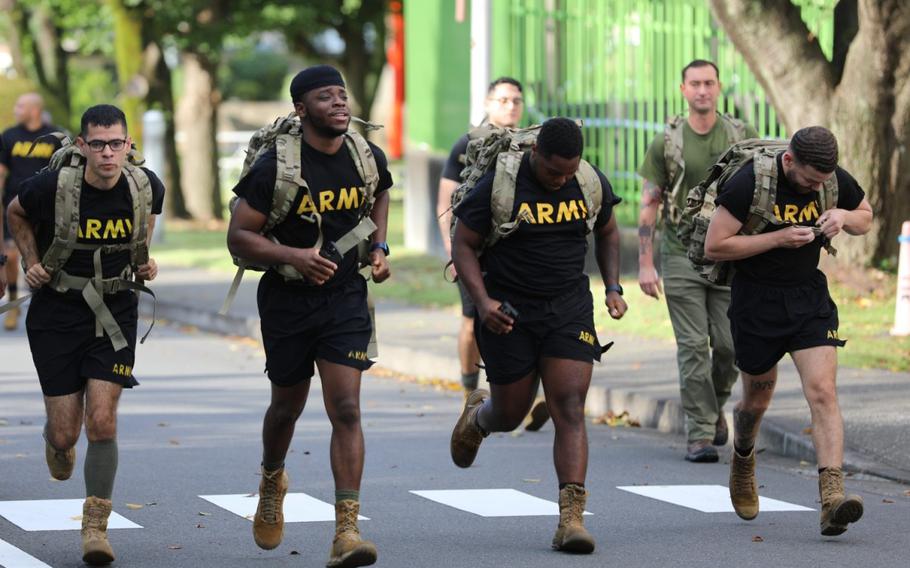 Hundreds of community residents participate in a suicide prevention awareness ruck march Sept. 20, 2024, on Camp Zama, Japan.