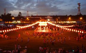 PNW21BON04
Joshua. C. Millage/Courtesy of the U.S. Navy
July 31, 2004 (file)

Bon Odori performers dance on NAF Atsugi's Reid Field.
NAF Atsugi opened its gates on Saturday, July 31, 2004, for the American Festival, followed immediately by the Bon Odori. The base has been hosting these events annually for more than 40 years, in an effort to foster positive relations between NAF Atsugi and its host nation of Japan. 
The Bon Odori, or Bon 'dance,' is a venerable Japanese tradition to welcome back ancestors' spirits.


(pnw# 33p cs)