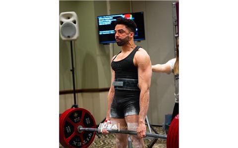 Photo Of U.S. Air Force Staff Sgt. Wilmer Hernandez, 374th Surgical Operations Squadron ultrasound NCO in charge, completes a deadlift at the USA Powerlifting Military, Police & Firefighter National Championship, Mar. 15, 2025. Weighing a total of 148 lbs, Hernandez accomplished squatting over 407 lbs, benching over 264 lbs and deadlifting over 540 lbs. 