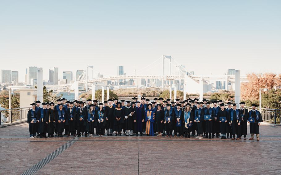 Graduates pose.