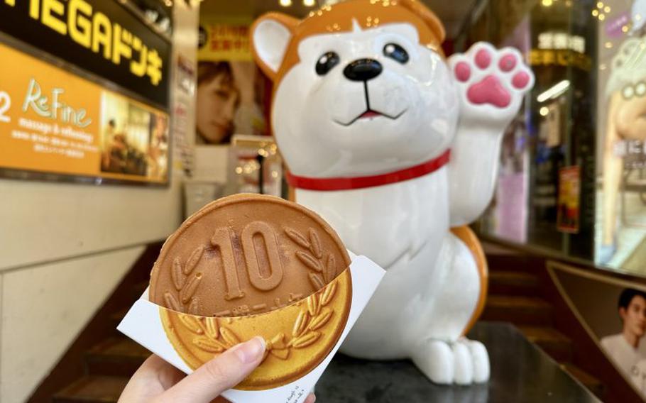 Pose with the Hachiko statue at the back of the store!