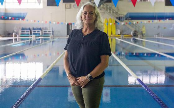 Jennifer Ayers, the Marine Corps Air Station Iwakuni aquatics director and a South Carolina native, poses for a portrait at the Marine Corps Community Services’ indoor pool on Sept. 5, 2024. Ayers and the MCAS Iwakuni aquatics team provide swim clinics and master classes, and train instructors with the goal to improve service members’ survival skills and increase their water confidence.