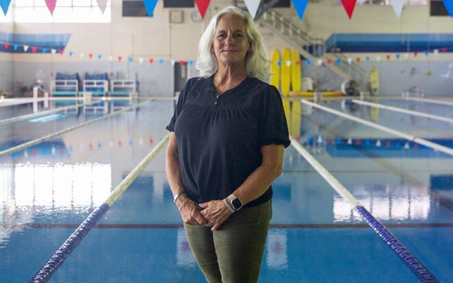 Jennifer Ayers, the Marine Corps Air Station Iwakuni aquatics director and a South Carolina native, poses for a portrait at the Marine Corps Community Services’ indoor pool on Sept. 5, 2024. Ayers and the MCAS Iwakuni aquatics team provide swim clinics and master classes, and train instructors with the goal to improve service members’ survival skills and increase their water confidence.