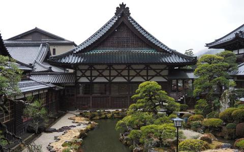 Photo Of A pond can be seen in the garden of the temple. 