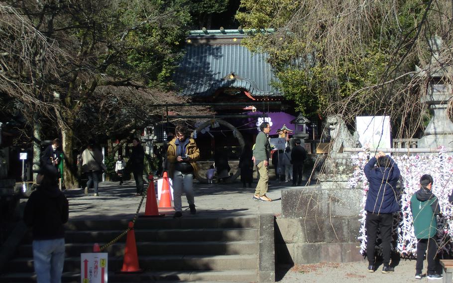 Some visitors can be seen in Izusan Shrine.