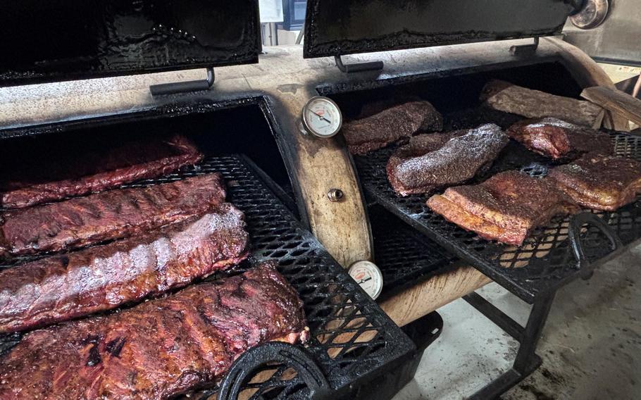 ribs are being grilled.