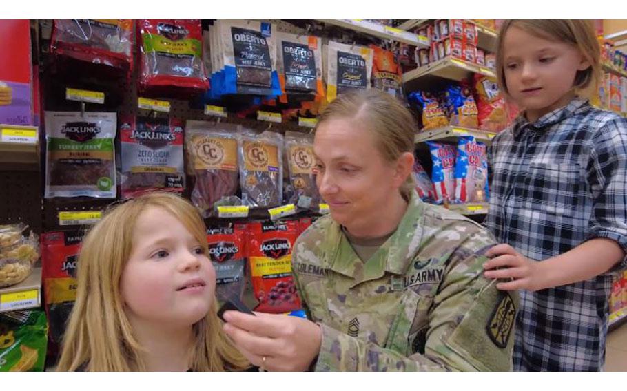 A family is at a snack section in Commissary. 