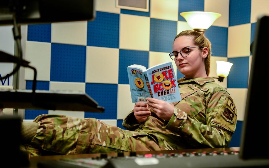 SSgt Ireland Summers is reading a book.