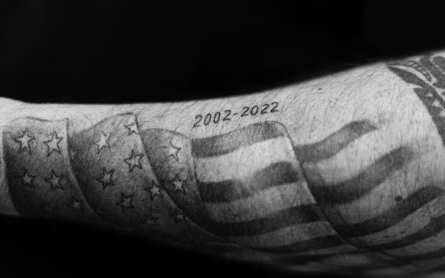 american flag tattoo on one’s hand.