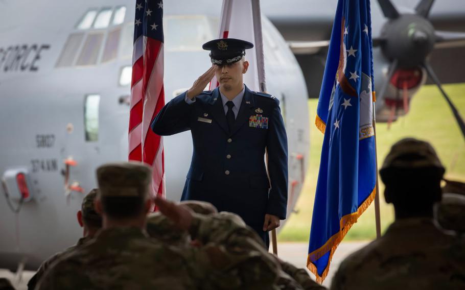 U.S. Air Force Col. Martin Perez renders a first salute.