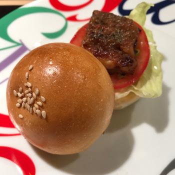 Eel burger on a plate.