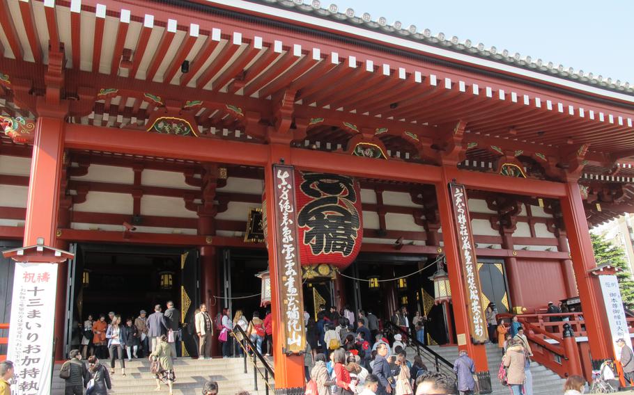 Visitors enjoy Sensoji Temple.