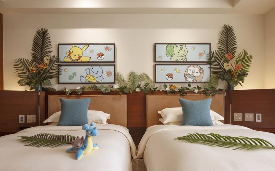 A stuffed pokemonon the bed.