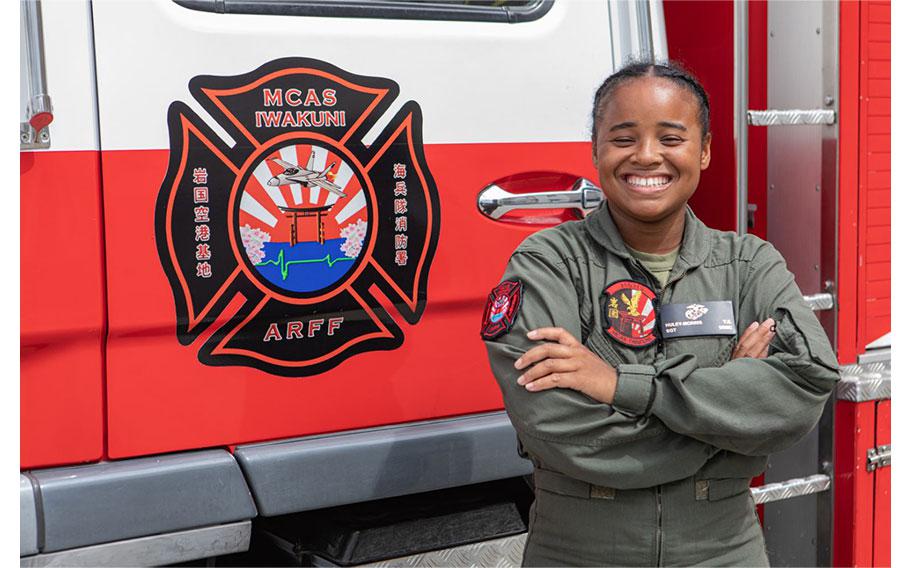 U.S. Marine Corps Sgt. Yasmine Huley-Morris, the station station captain of Aircraft Rescue and Firefighting (ARFF), Headquarters and Headquarters Squadron (H&HS), Marine Corps Air Station Iwakuni, and a native of Virginia, stands in front of a fire truck for a picture at MCAS Iwakuni, Japan, June 4, 2024. Huley-Morris recently received the Military Firefighter of the Year award for all military services. The award recognizes the firefighters accomplishments of the preceding year for setting the example of professional activities and career development goals.