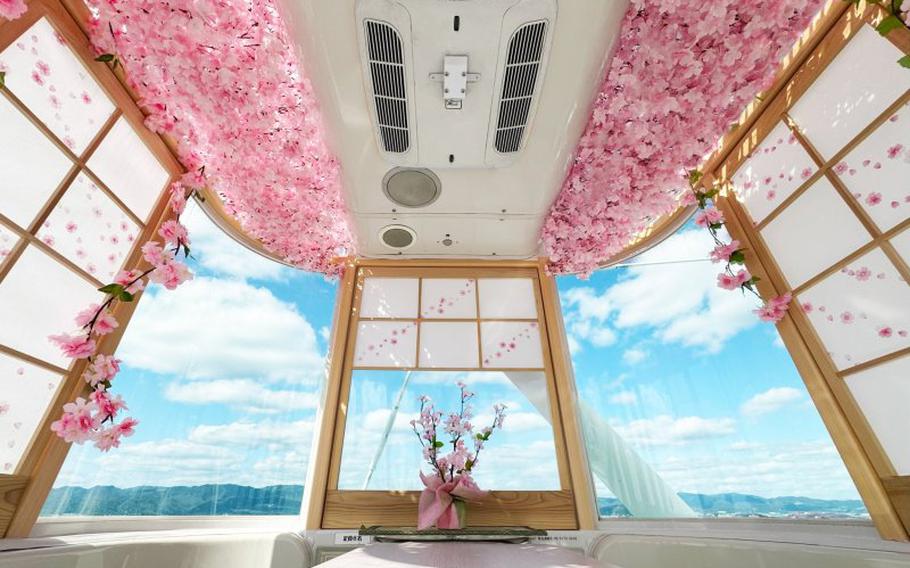 inside the ferris wheel. artificial cherry blossoms are decorated.