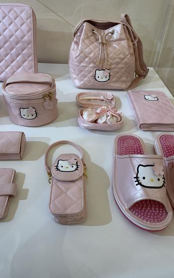 hello kitty goods such as slippers smart phone case.