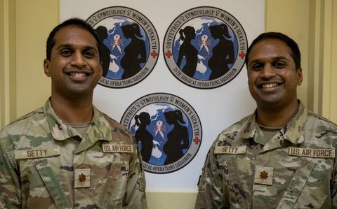 Photo Of U.S. Air Force Maj. Vinay Setty and  Maj. Vijay Setty pose for a photo.