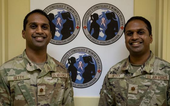 U.S. Air Force Maj. Vinay Setty and  Maj. Vijay Setty pose for a photo.