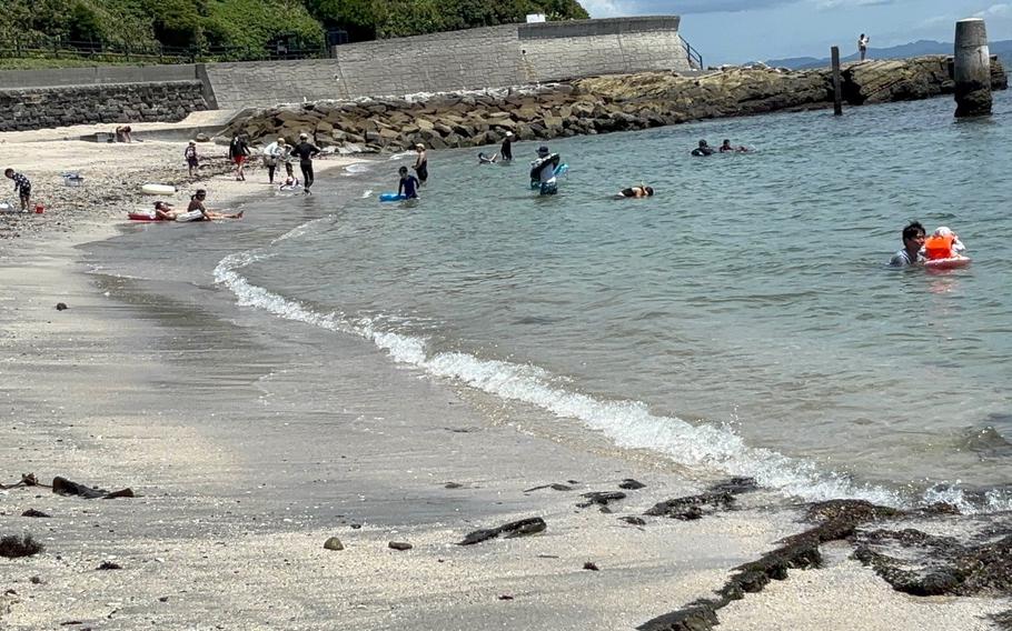 People enjoy themselves on Tatara Beach.