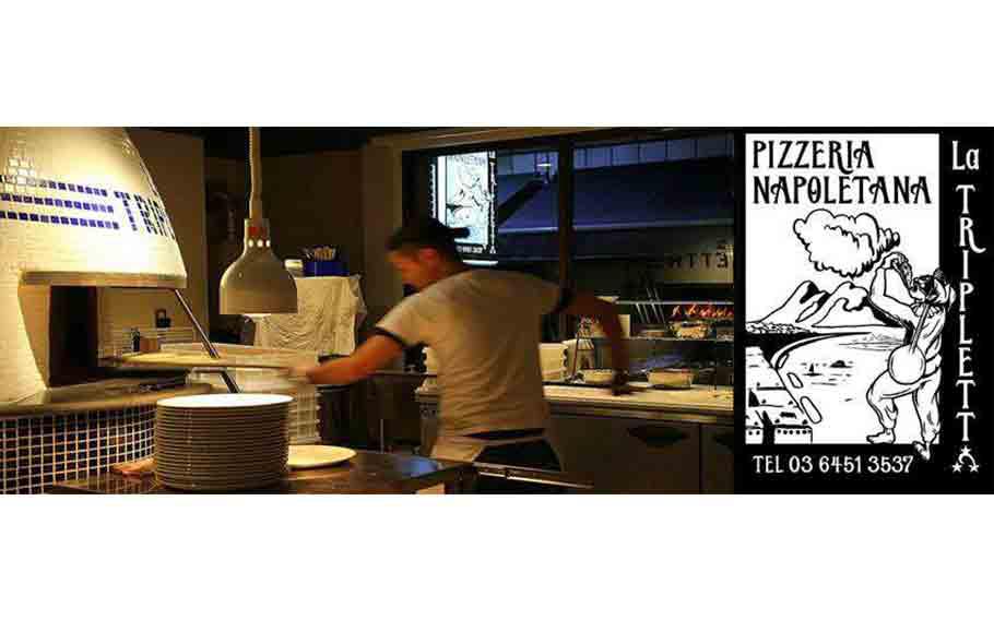 La Tripletta staff cooking pizza