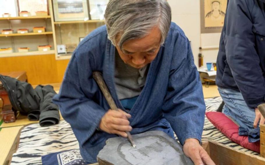 Amehata inkstone making with an artisan.