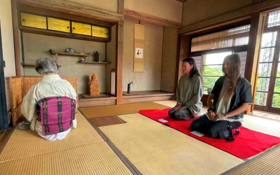 Two students are taking tea ceremony class.