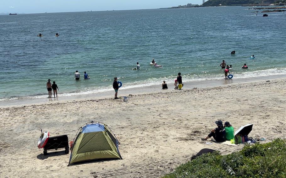 People enjoy themselves on Tatara Beach.