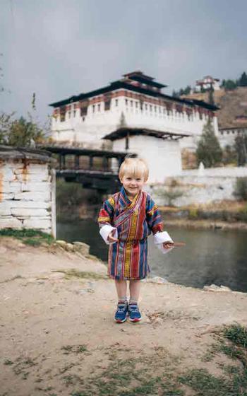 Author’s son wearing traditional Bhutanese-dress.