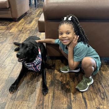 Rookie visits military families at USO Yokosuka every Wednesday.