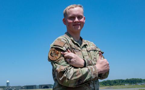 Photo Of U.S. Air Force Airman Quintin Humber stands on the flightline.