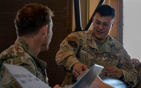 Photo Of U.S. Air Force Senior Airman Victor Sanchez-Robles explains bomb assembly to Col. Paul Davidson during a Wild Weasel Walk-through at Misawa Air Base, Japan, Oct. 31, 2024. 