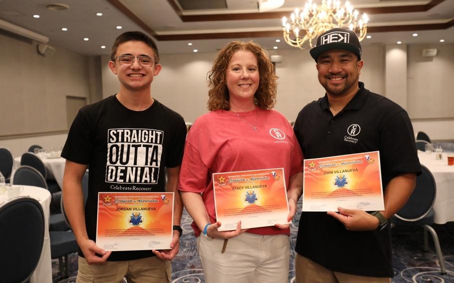 John Villanueva, right, and his family were among those honored during an appreciation dinner Sept. 16 at the Camp Zama Community Club to recognize the contributions of several volunteers in the community. 